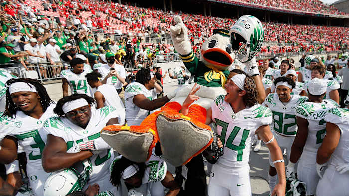 Oregon football celebrates its win over Ohio State